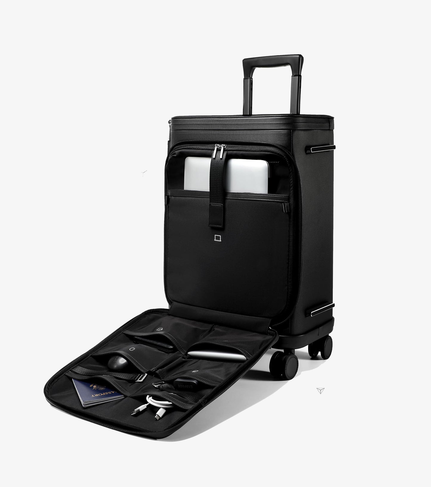 Black suitcase with open front pocket displaying travel items on a white background
